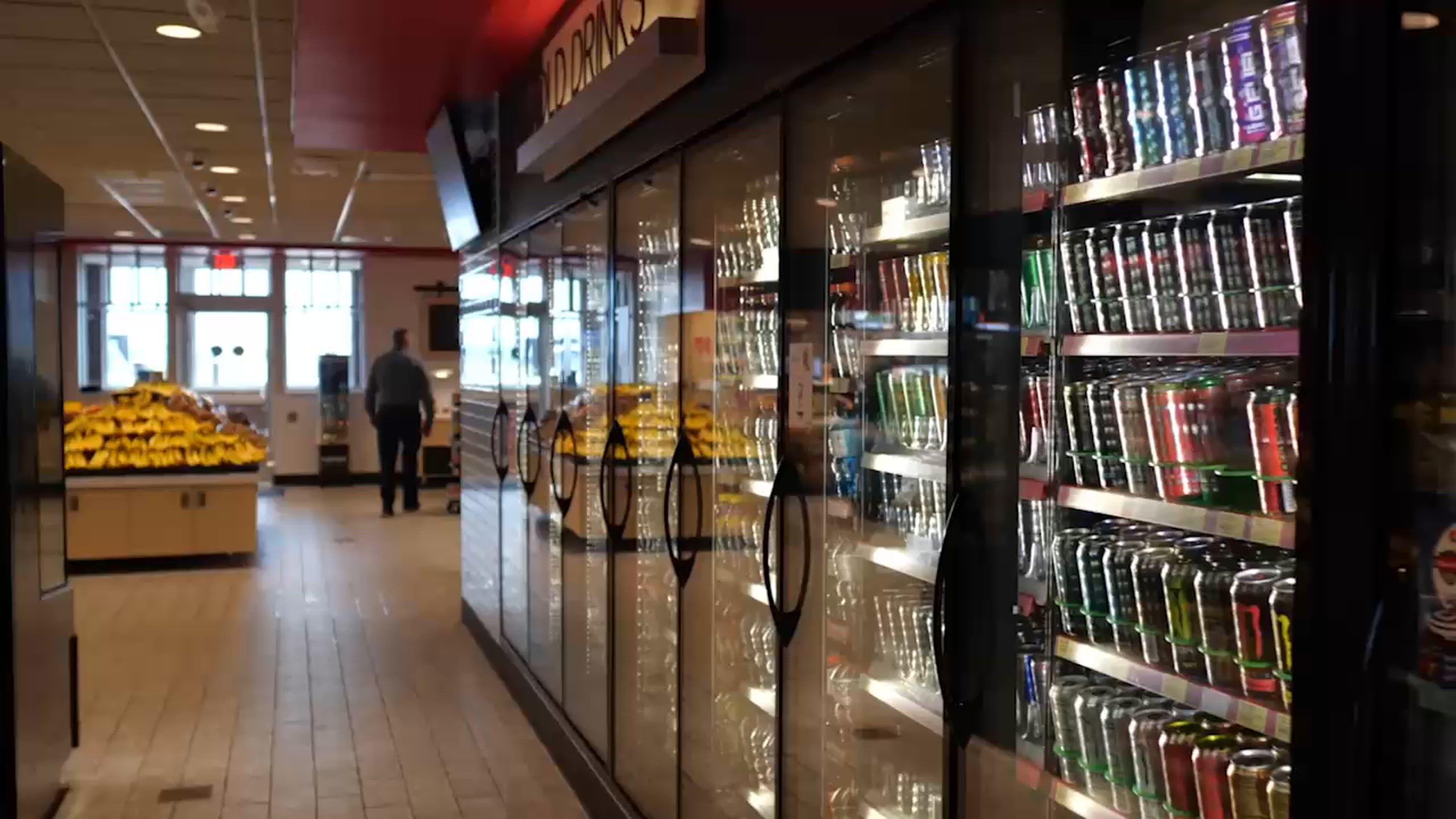 Shoppers and employees in a grocery store